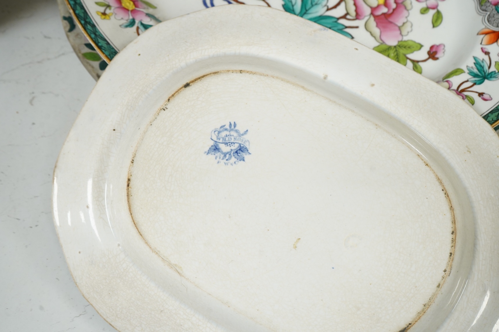 Three 19th century Staffordshire figures, including General Garibaldi, a Staffordshire pottery soup tureen and four serving plates, largest 48cm wide